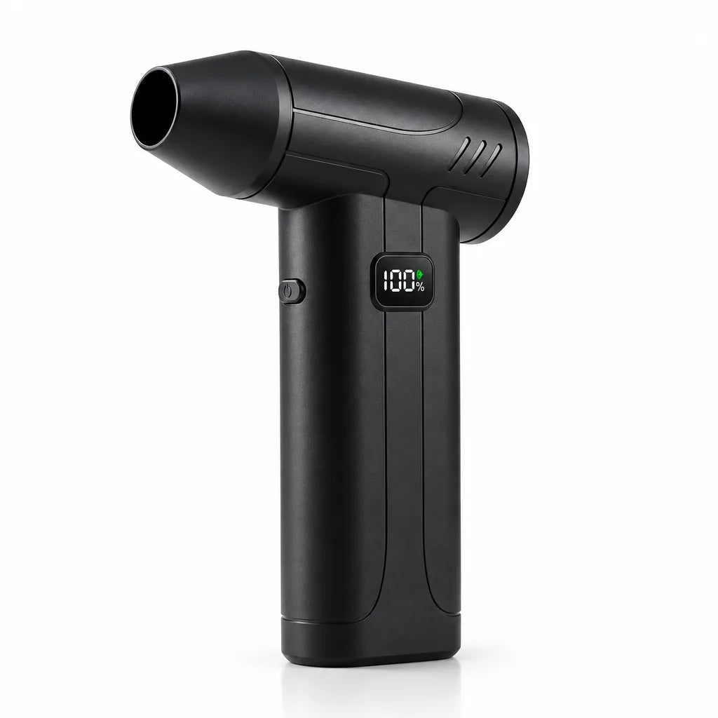 Black cordless air duster standing upright on a white background, its angled nozzle pointing up and a small digital display on the handle reading 100%, with a power button beside it.