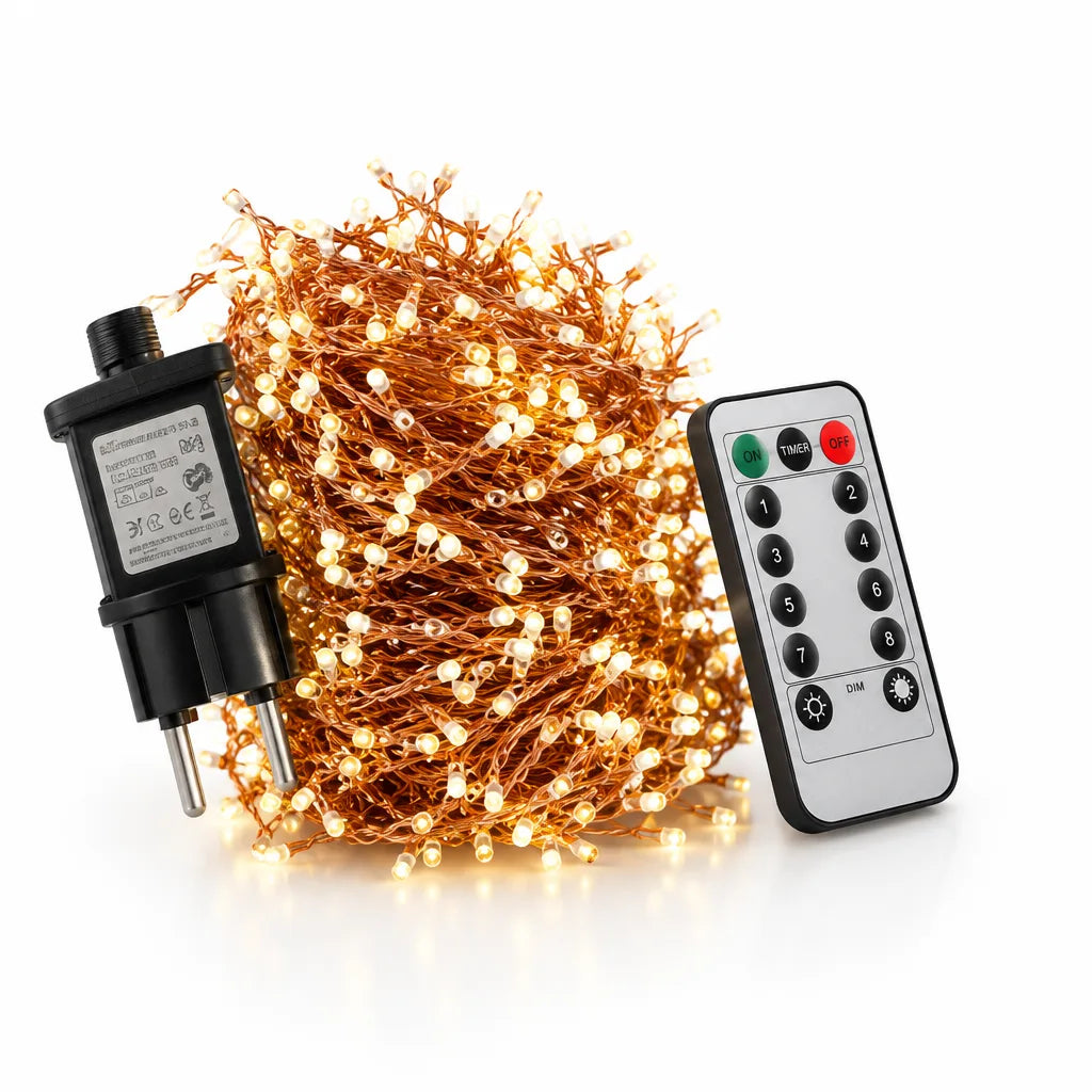 A coiled 30 m cluster LED string light on copper wire glowing warm white, shown with its black plug-in adapter on the left and a white remote with on, timer, off and dimming buttons on the right.