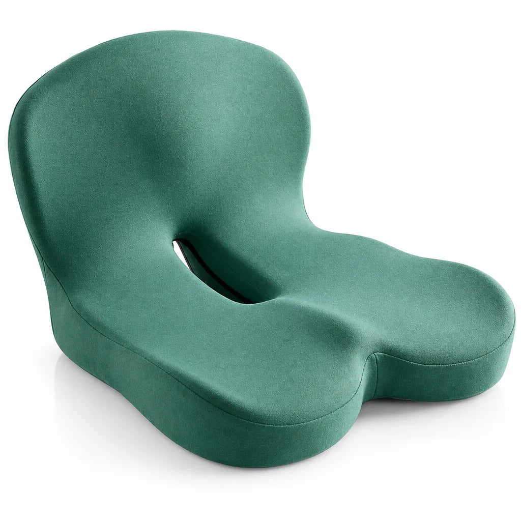 Green memory foam seat cushion with a contoured U-shaped cutout and raised back support, shown at an angle against a white background.
