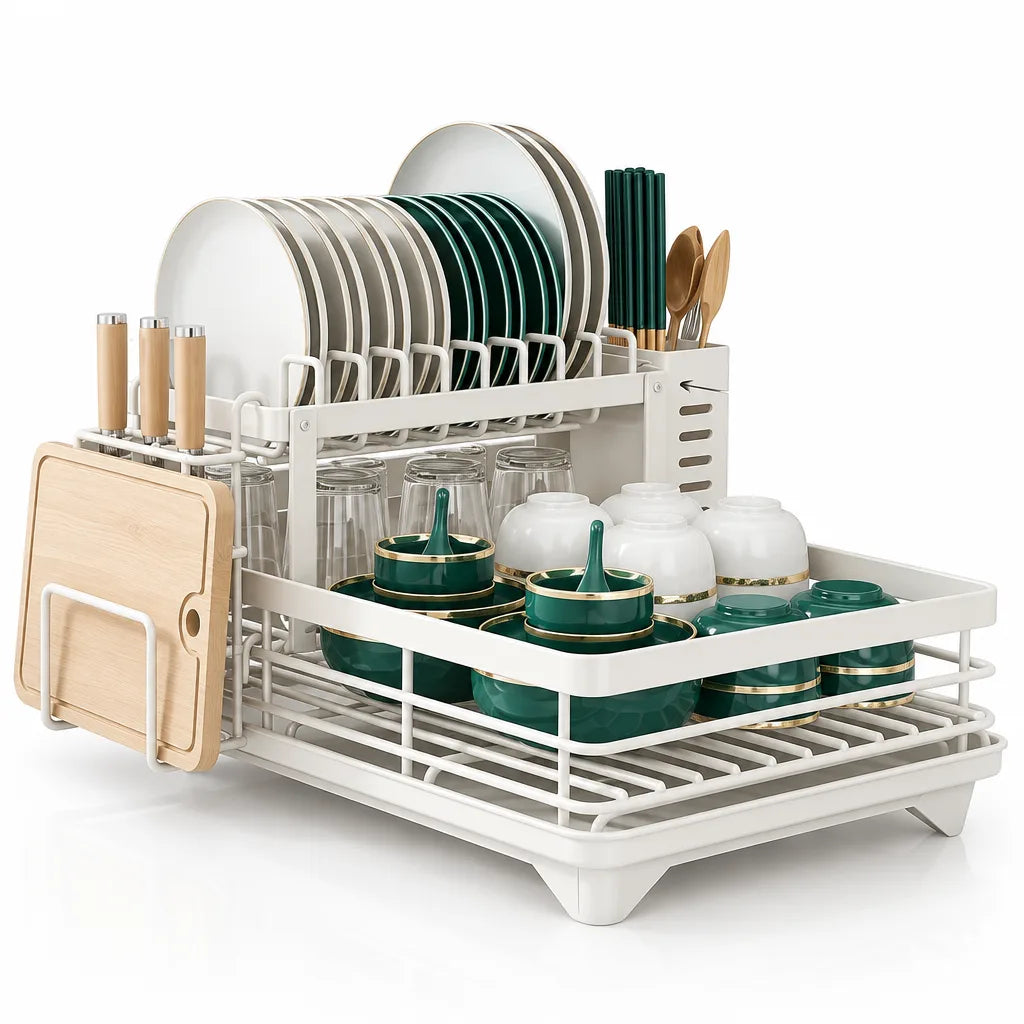 White two-tier dish drying rack holding plates, green and white bowls, glasses, chopsticks and wooden utensils, with a side knife block and a light wood cutting board clipped to the end.