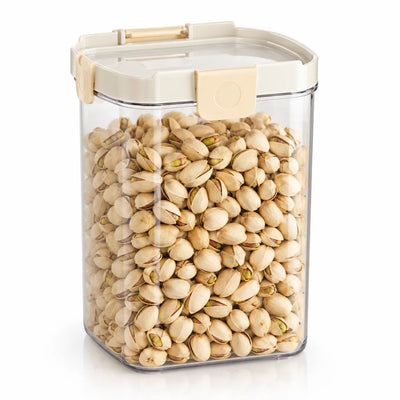 A clear square Food Storage Container filled with in-shell pistachios, its cream snap-lock lid closed with side latches, shown against a white background.