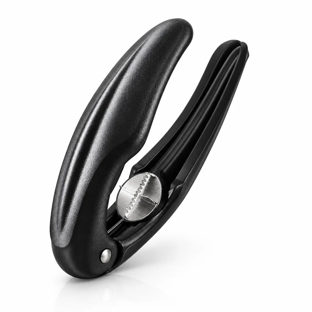 Black plastic nutcracker for chestnuts and hard nuts, shown open at an angle on a white background with its serrated stainless steel cracking wheel visible between the handles.