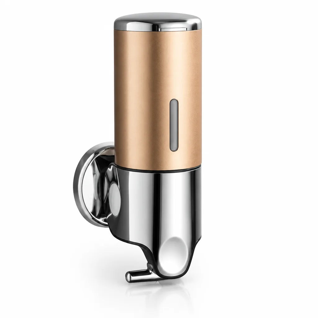 Wall-mounted soap dispenser with a brushed gold cylindrical body, polished chrome top, pump base and round wall bracket, shown against a plain white background.