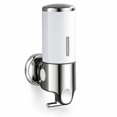 A white and polished chrome wall-mounted soap dispenser shown against a plain white background, with a rounded chrome mounting plate, a narrow level window on the white cylinder, and a curved metal push lever at the bottom.