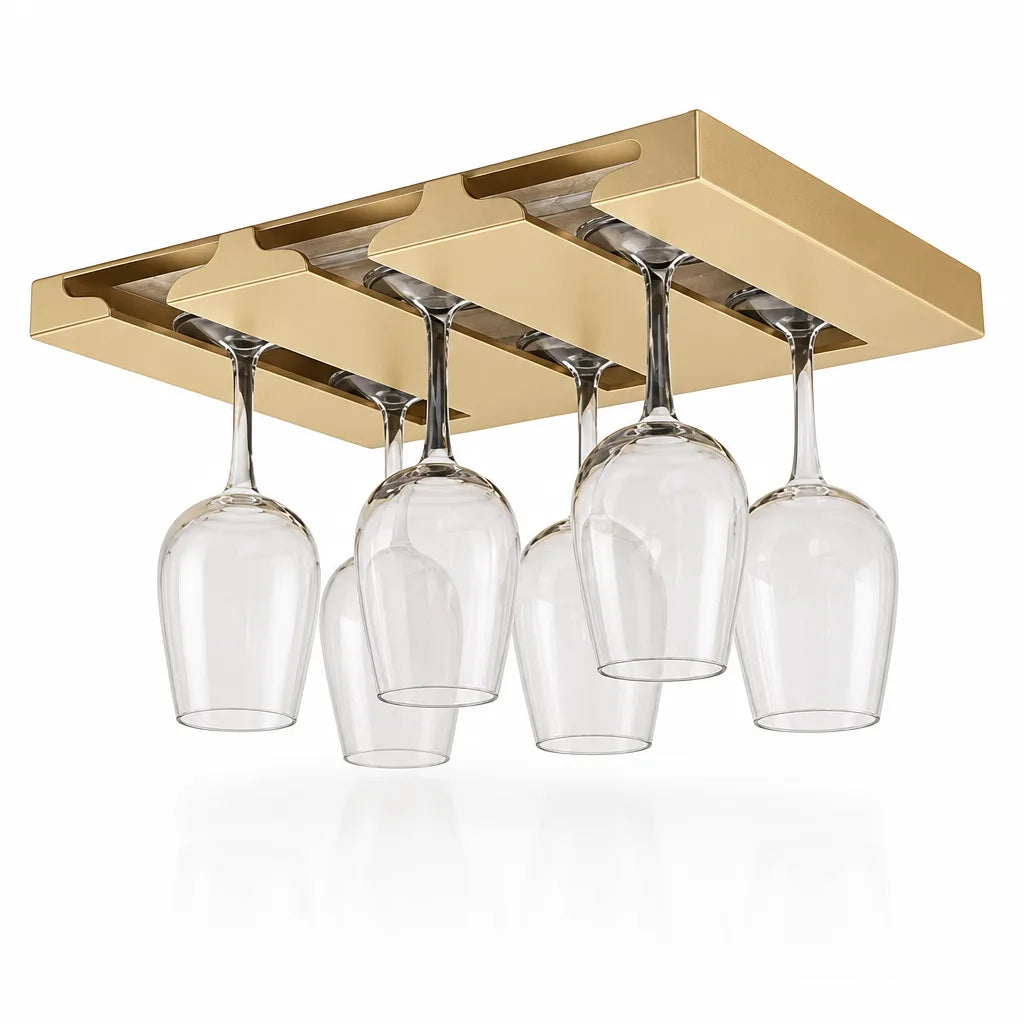 Gold-toned under-cabinet wine glass rack with three slots, holding six clear stemmed glasses upside down against a white background.